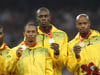 Nesta Carter, Michael Frater, Usain Bolt und Asafa Powell (l-r) mussten ihr Staffel-Gold von 2008 zurückgeben.
