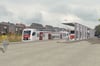 So könnte es nach den bisherigen Entwürfen aussehen: Ein Personenzug hält an der Mobilstation in Sendenhorst.
