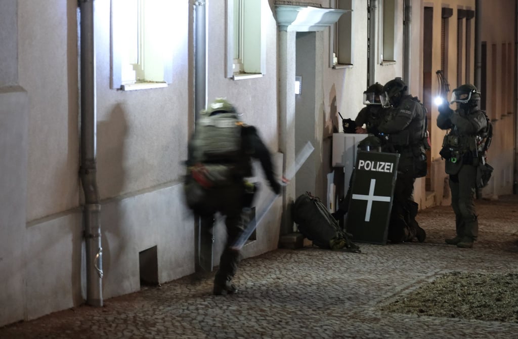 Early in the morning, police searched a residential building in connection with the attack on the Christmas market.