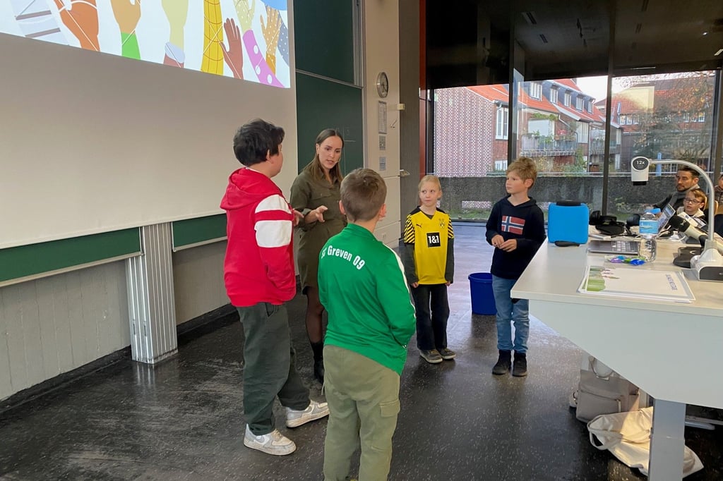 Live-Experiment mit Anfeuerungsrufen im Hörsaal